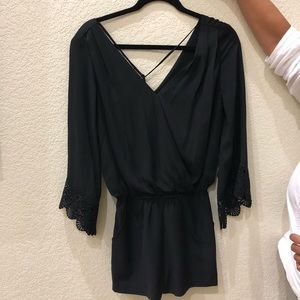 Black long sleeve romper with lace black detailing